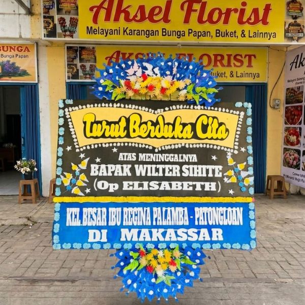 Papan bunga medan perjuangan aksel florist
